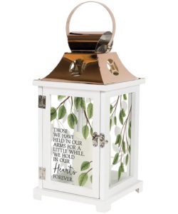 This gorgeous memory lantern is made from quality composite wood and a stainless steel copper finish top. It features a built-in automatic timer which runs for 6 hours on and 18 hours off 3-AAA batteries. Inscribed with a sentimental quotes.... "Those we hold in our arms for a little while, we hold in our hearts forever."